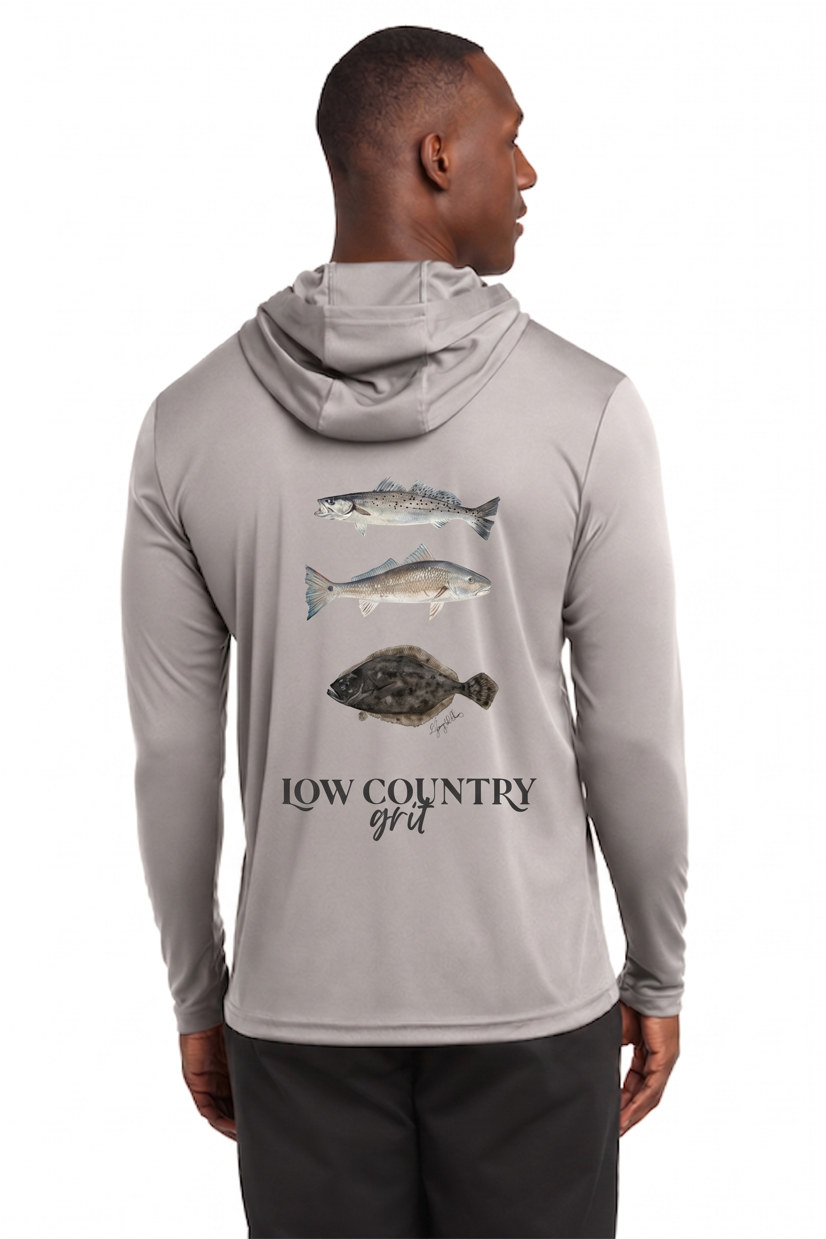 Man wearing a gray hoodie with fish graphics and 'Low Country Girl' text on the back.